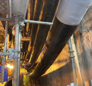 Long view of pipes with composite pipe repair