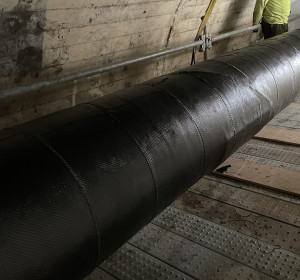 Composite pipe repair for underground power transmission pipe-type cable.