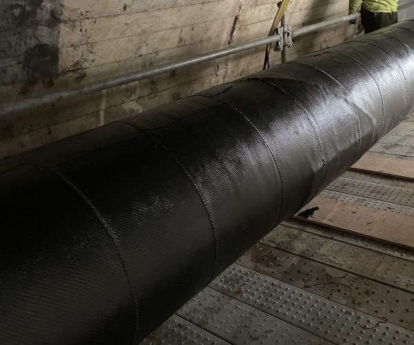 Composite pipe repair for underground power transmission pipe-type cable.