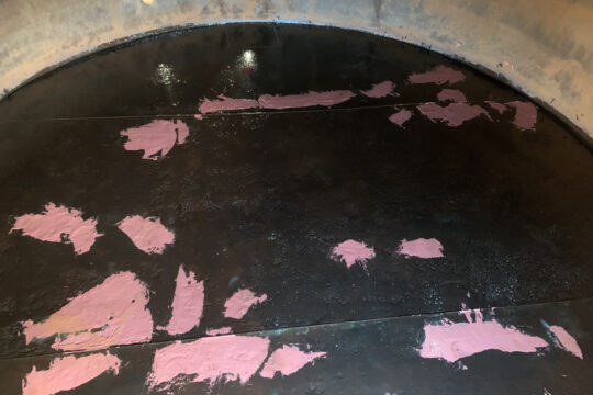 Composite fabric on the floor of a 10-foot diameter tank