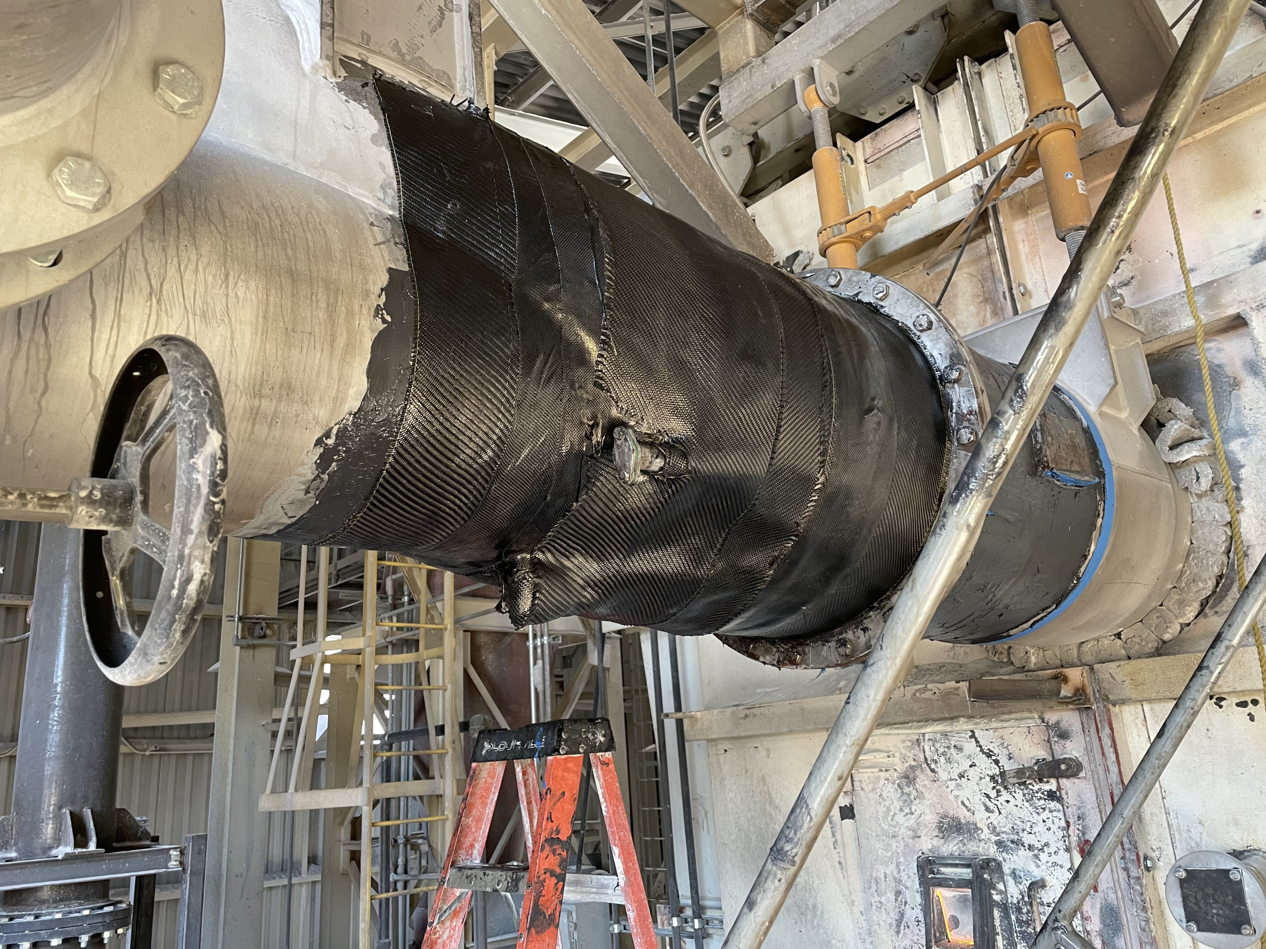 Composite wrap on large section of custom pipe