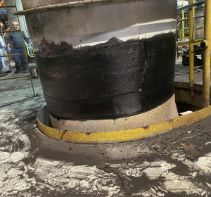 Composite wrap on a large pipe in a coal-fired power plant.