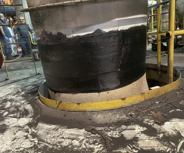 Composite wrap on a large pipe in a coal-fired power plant.