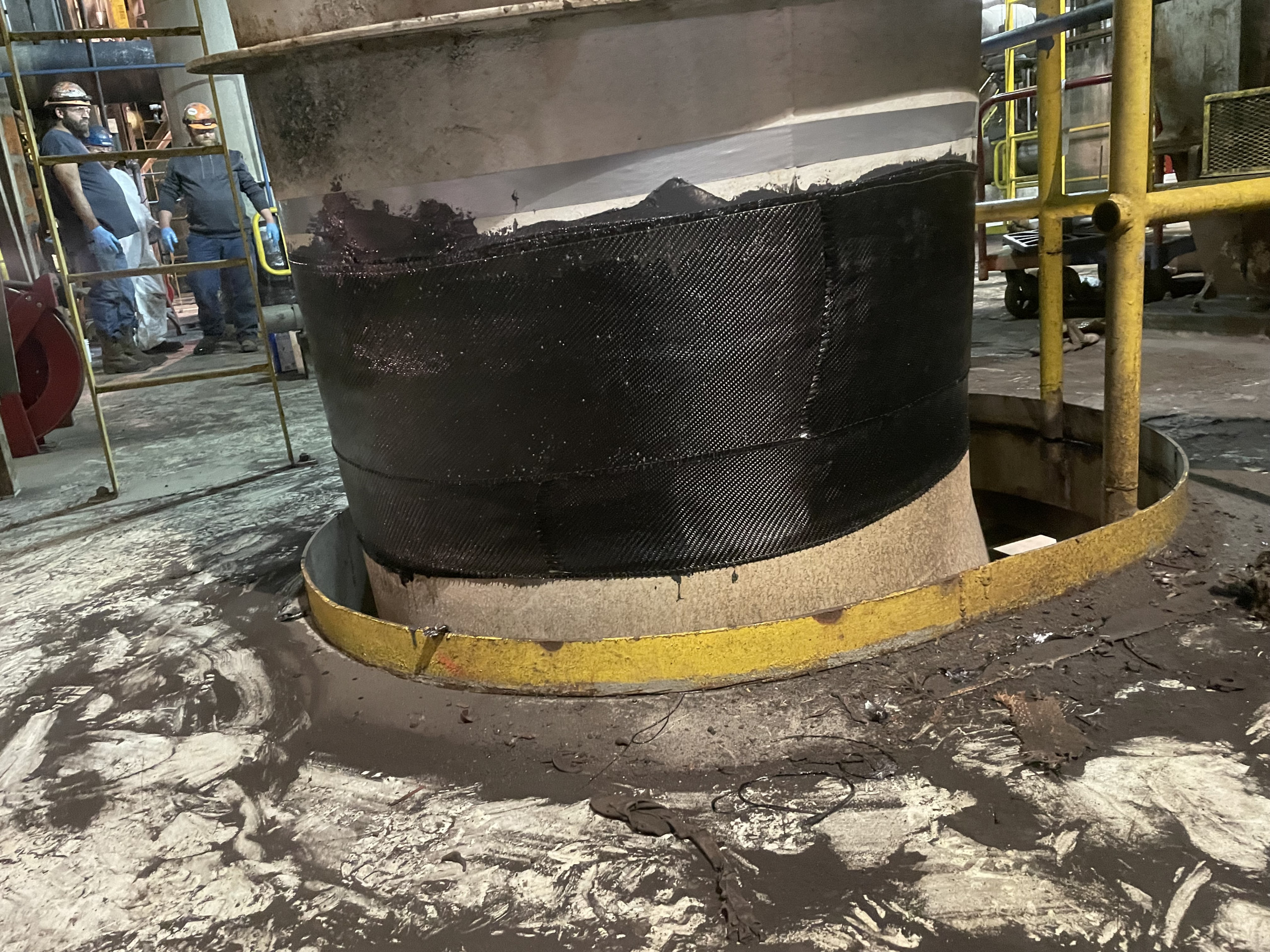 Composite wrap on a large pipe in a coal-fired power plant.