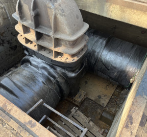 Composite wrap repair on large underground pipeline